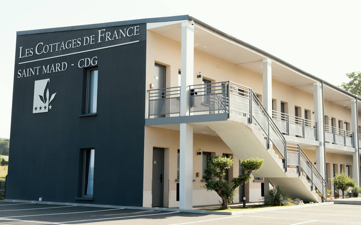 Exterior of the hotel | Les Cottages de France, hotel near Parc Astérix